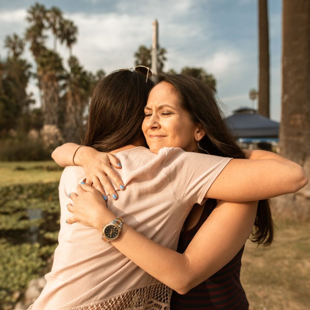 AOI-How to Manage Pain After an Orthopedic Trauma 6 two woman hugging