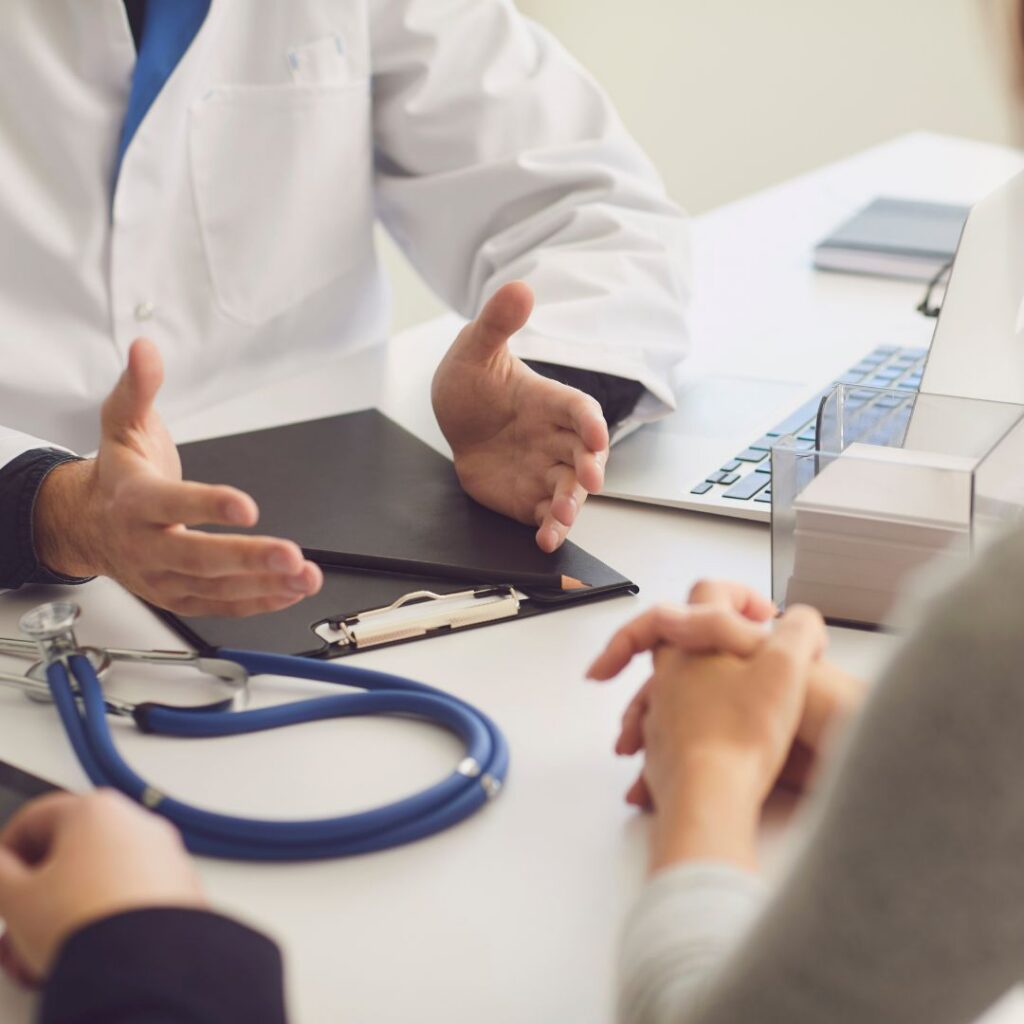 an orthopedic specialist discussing options with the patient